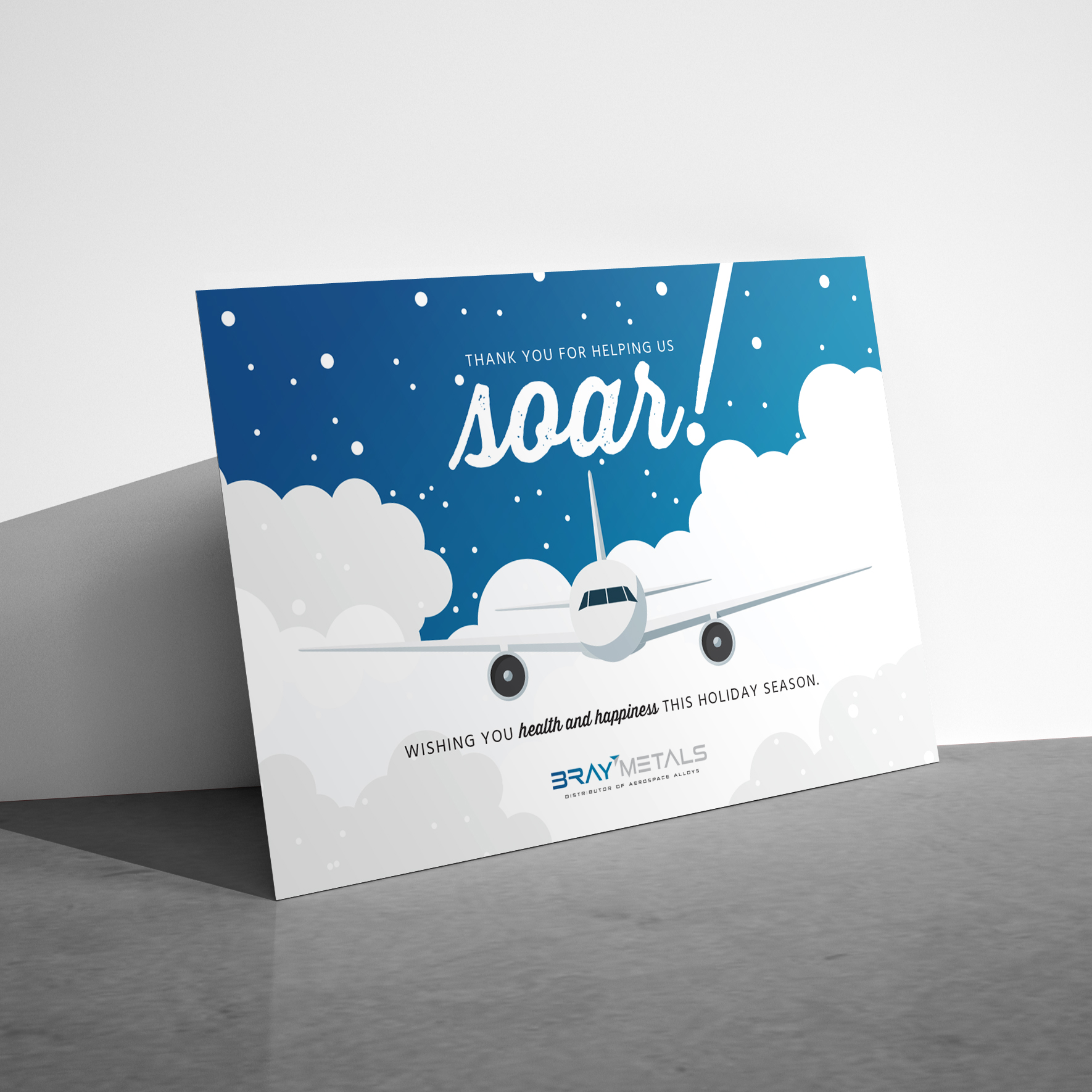 2019 Holiday Season postcard with illustration of a plane and the words 'thank you for helping us soar'. Designed for Bray Metals.